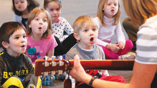Children's Ministry - teacher with large group
